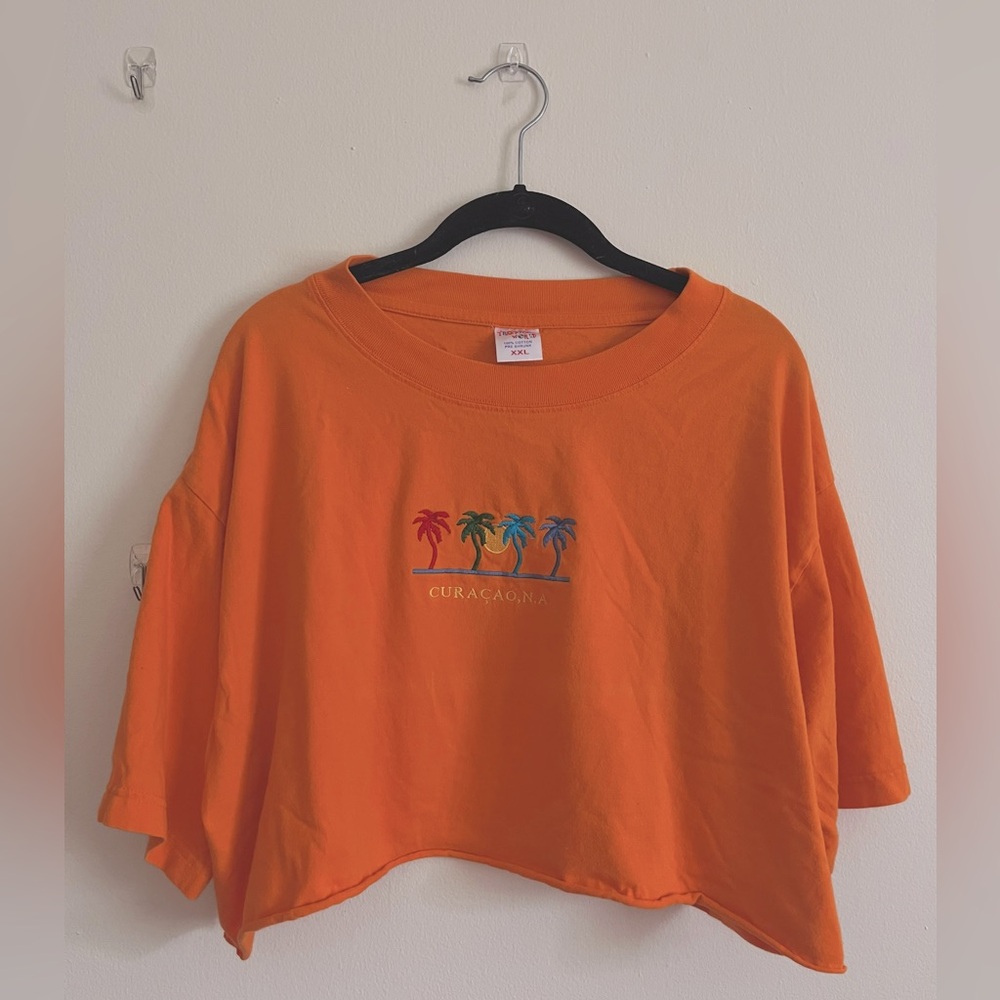 neon orange Curaçao tee w/ embroidered palm trees